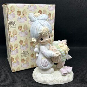Precious Moments “Be not weary in well doing” figurine